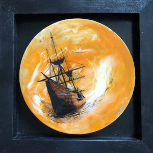 Black square frame with a circular art work. Orange abstract background with an acrylic painting of the Mayflower